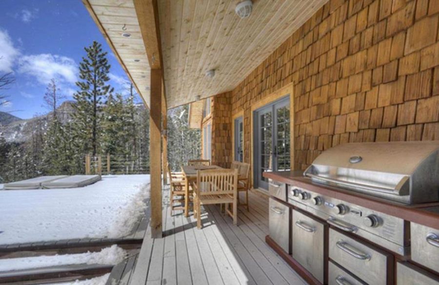 The porch and grill of one of our Durango Colorado Cabins with Hot Tubs