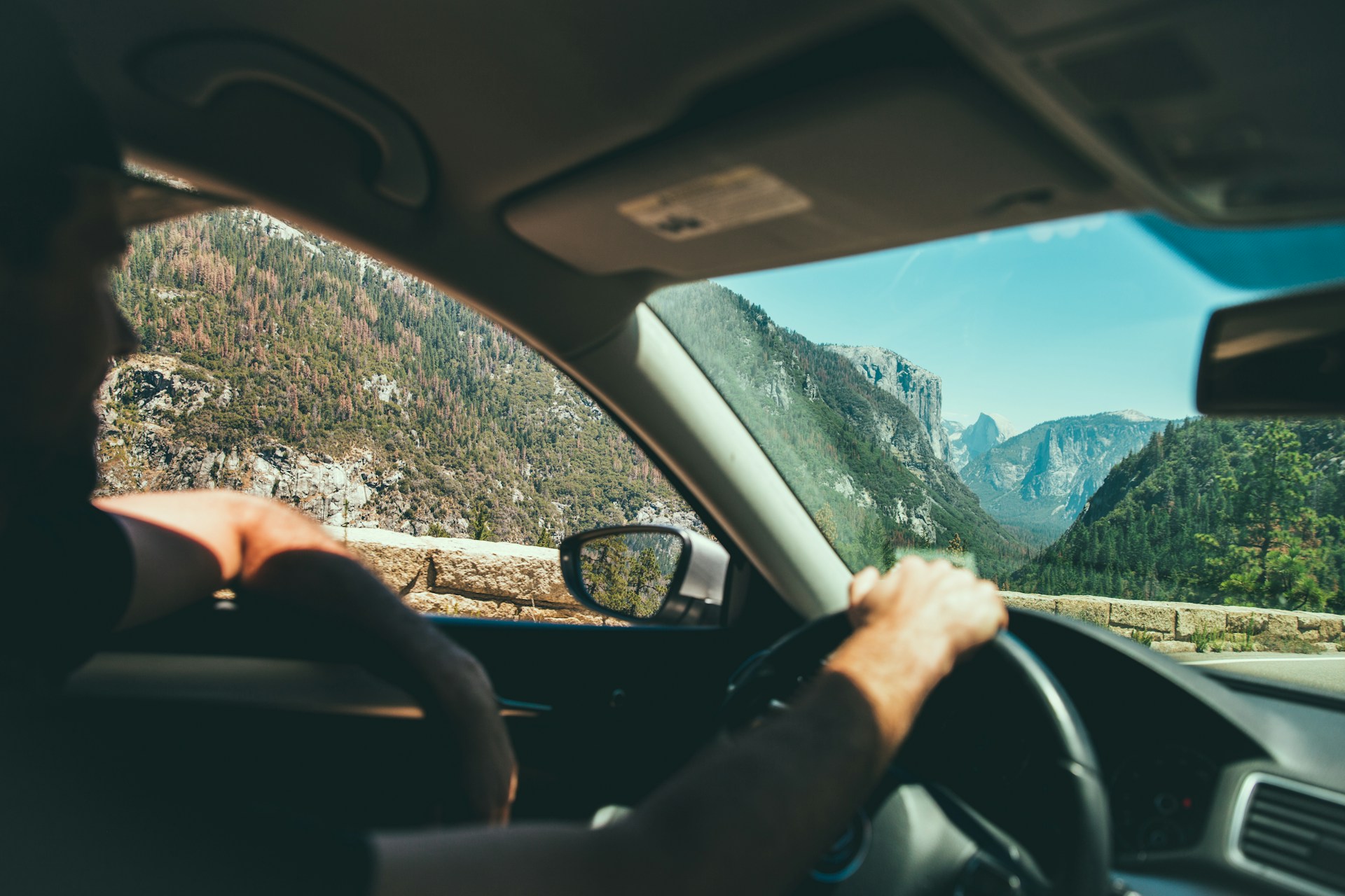 A person driving a car